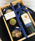 Caja con botella de vino