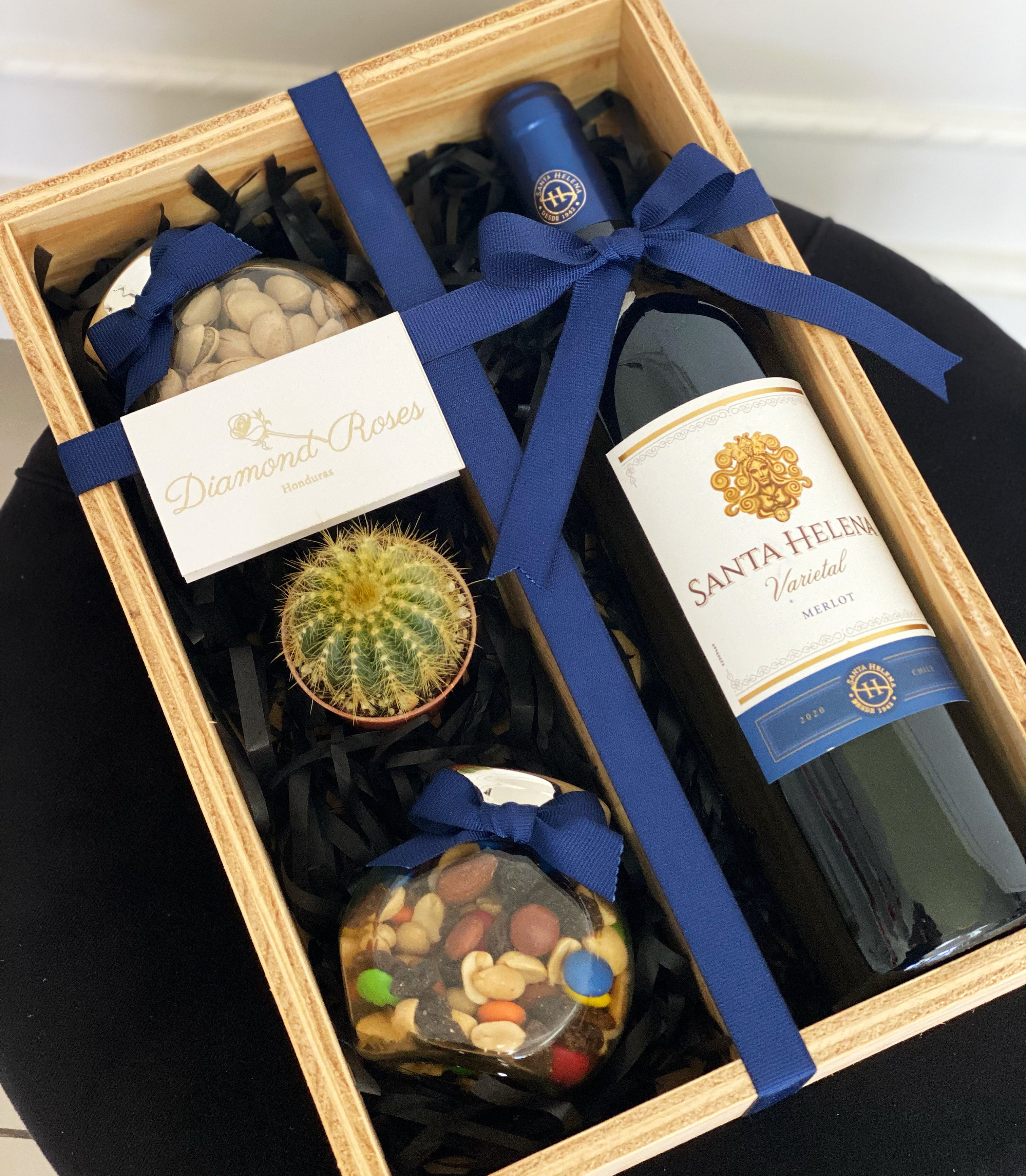 Caja con botella de vino